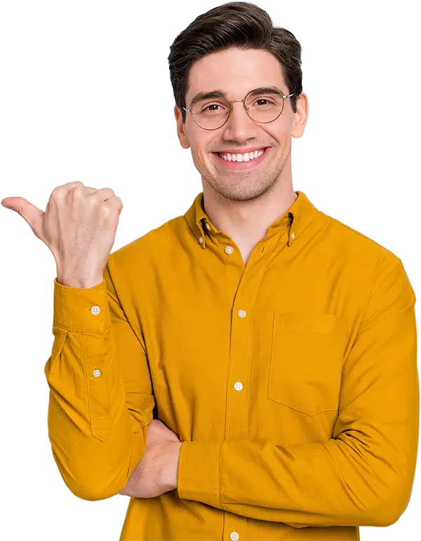 smiling man in yellow shirt poiting his thumb right